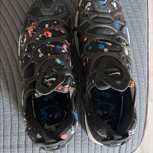 Nike Black Sneakers with Blue and Orange Accents